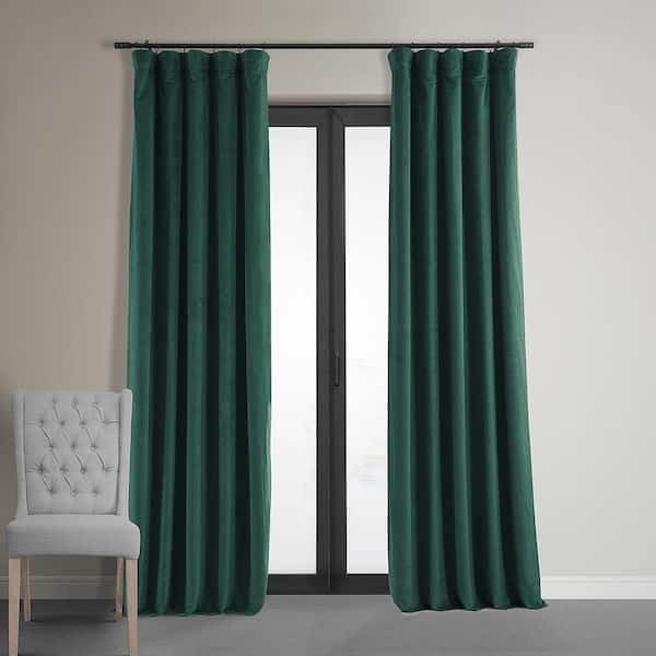 Exclusive Fabrics & Furnishings Blackforest Green Velvet Solid 50 in. W x 120 in. L Lined Rod Pocket Blackout Curtain