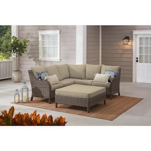 Windsor 4-Piece Brown Wicker Outdoor Patio Sectional Sofa with Ottoman and CushionGuard Putty Tan Cushions