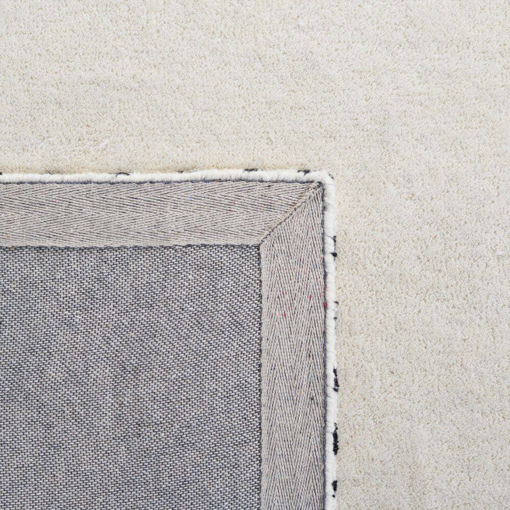 Ivory and Black Rectangular Wool Tufted Area Rug 8' x 10'