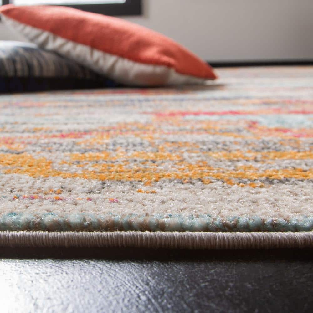 Ivory and Multicolor Abstract Synthetic Area Rug, 4' x 6'