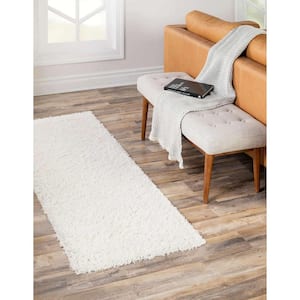 Solid Shag Snow White 2' 2 x 6' 7 Area Rug