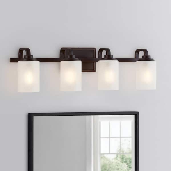 Hampton Bay Hartford Lake 29 in. 4-Light Oil Rubbed Bronze Rustic Farmhouse Bathroom Vanity Light with Linen Glass Shades