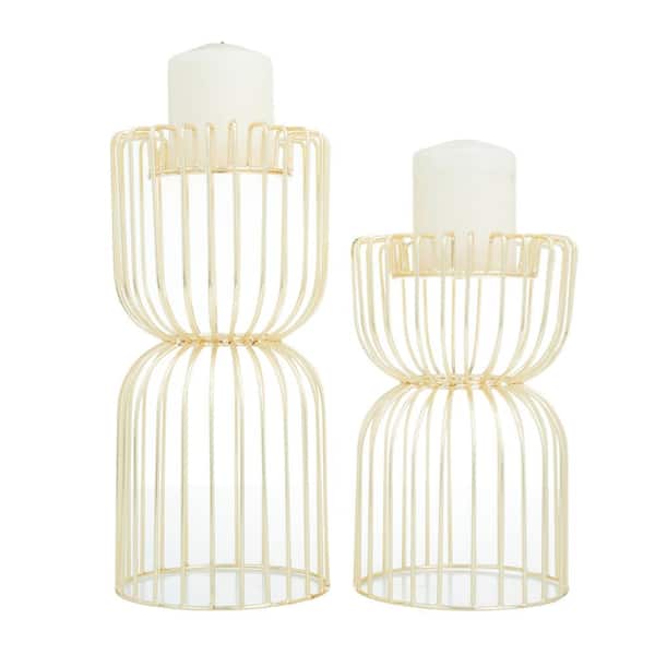 CosmoLiving by Cosmopolitan Gold Metal Pillar Candle Holder (Set of 2)