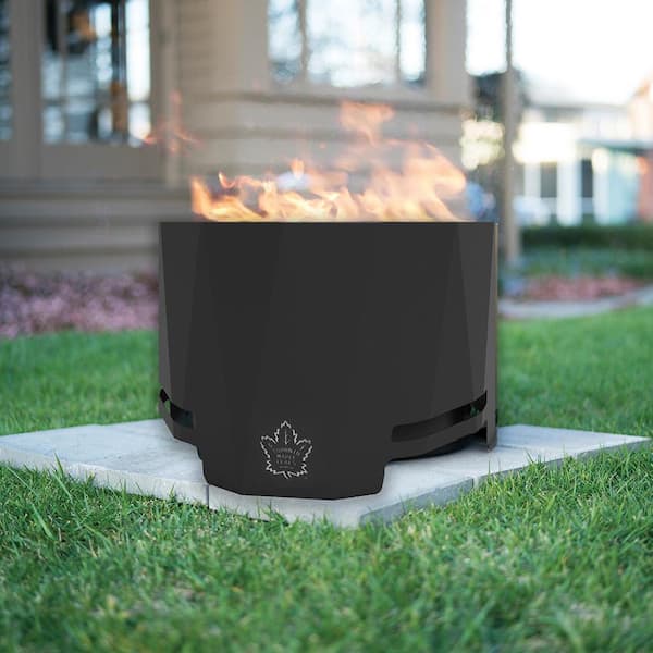 The Peak NHL 24 in. x 16 in. Round Steel Wood Patio Fire Pit with Spark Screen and Poker - Toronto Maple Leafs