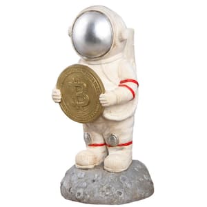 Astronaut Standing on Moon Statues