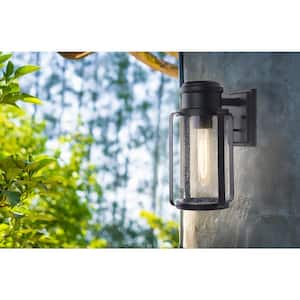 Abner 1-Light Matte Black Outdoor Wall Light Sconce with Clear Seedy Glass Shade
