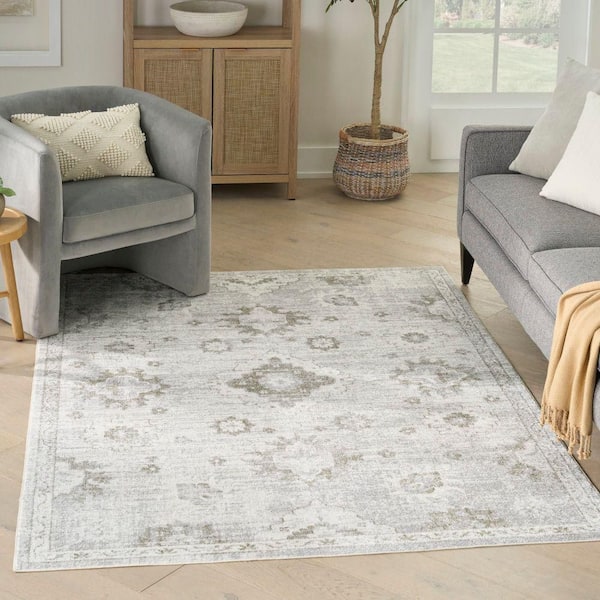 Astra Machine Washable Ivory 4 ft. x 6 ft. Distressed Traditional Area Rug