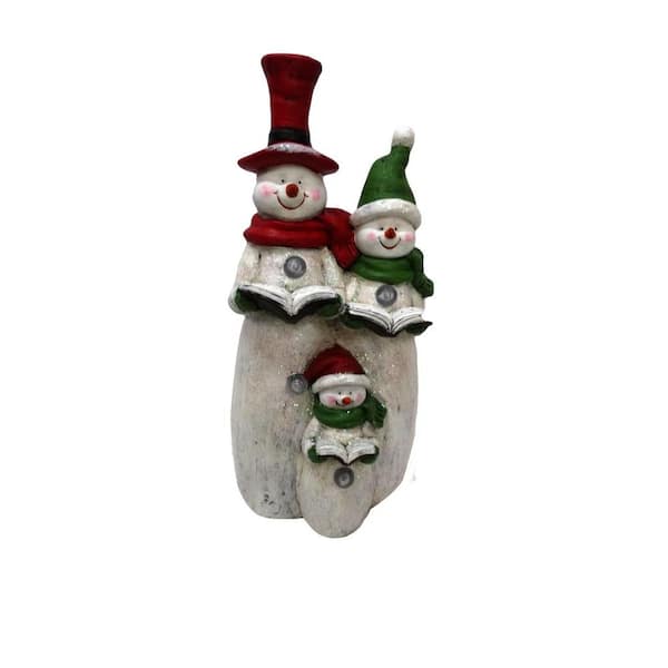 Alpine Corporation 22 in. Snowman Family Statuary Decor with 4 Color Changing LED Lights and Timer