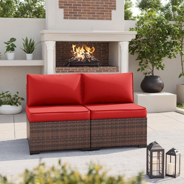 Brown Wicker Outdoor Loveseat with Red Cushions
