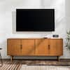 Welwick Designs 58 in. Caramel Solid Wood TV Stand Fits TVs Up to 65 in. with Cutout Cabinet Handles