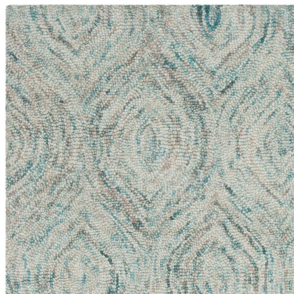 Ivory and Sea Blue Hand-Tufted Wool 6' x 9' Area Rug