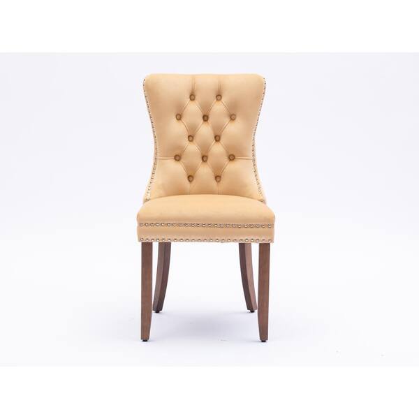 cream leather button back dining chairs