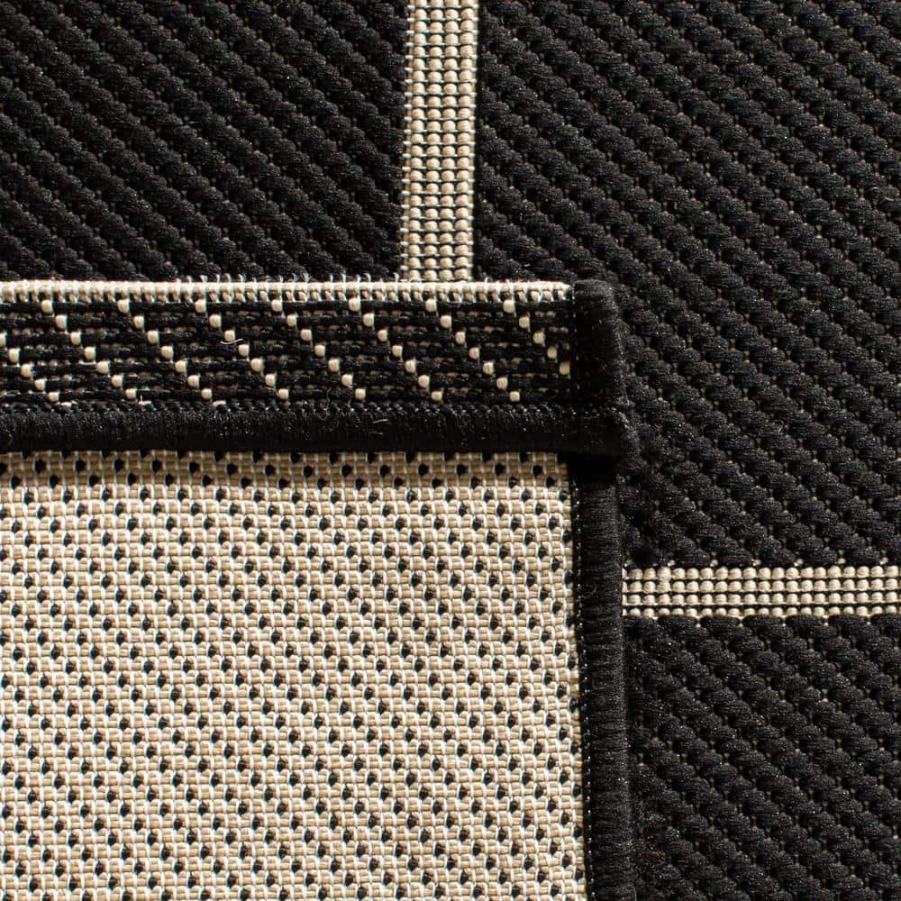 Black and Cream Rectangular Synthetic Indoor/Outdoor Rug