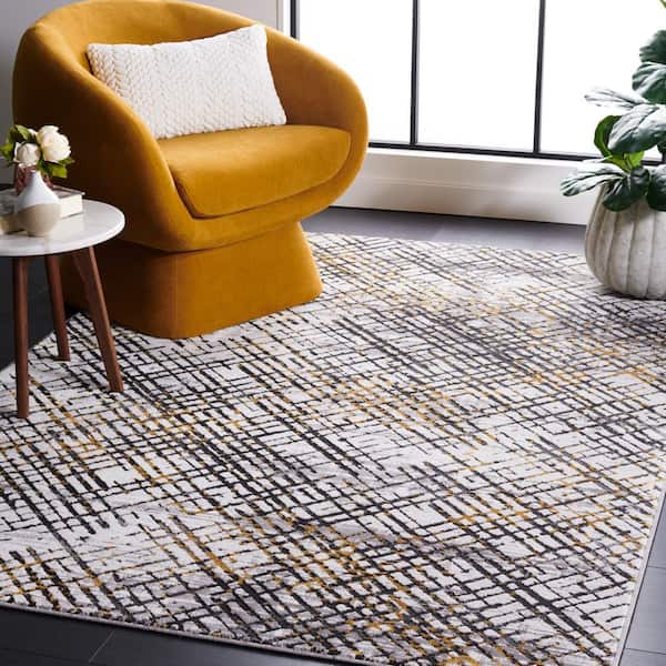 Amelia Charcoal/Gold 9 ft. x 12 ft. Abstract Gradient Striped Area Rug