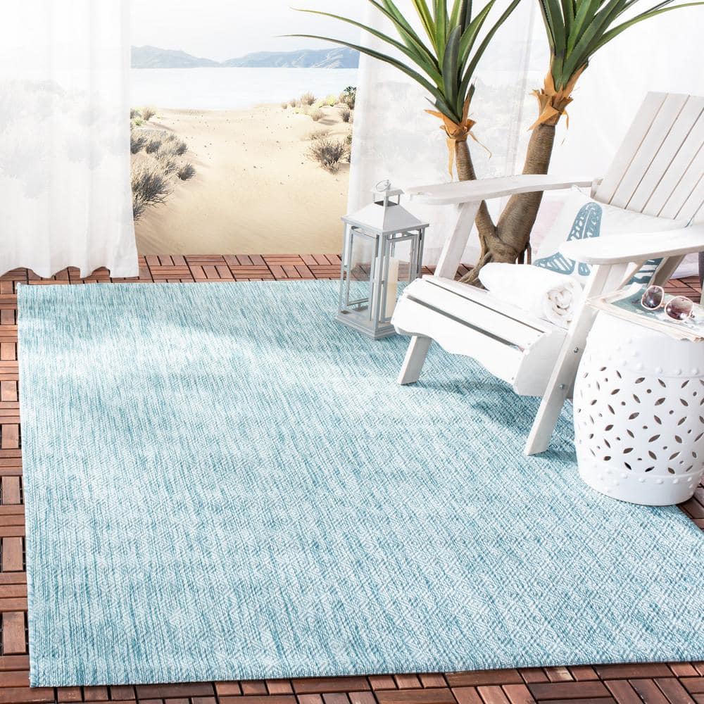 Aqua Delano Easy-Care 6'7" x 9'6" Synthetic Indoor/Outdoor Rug