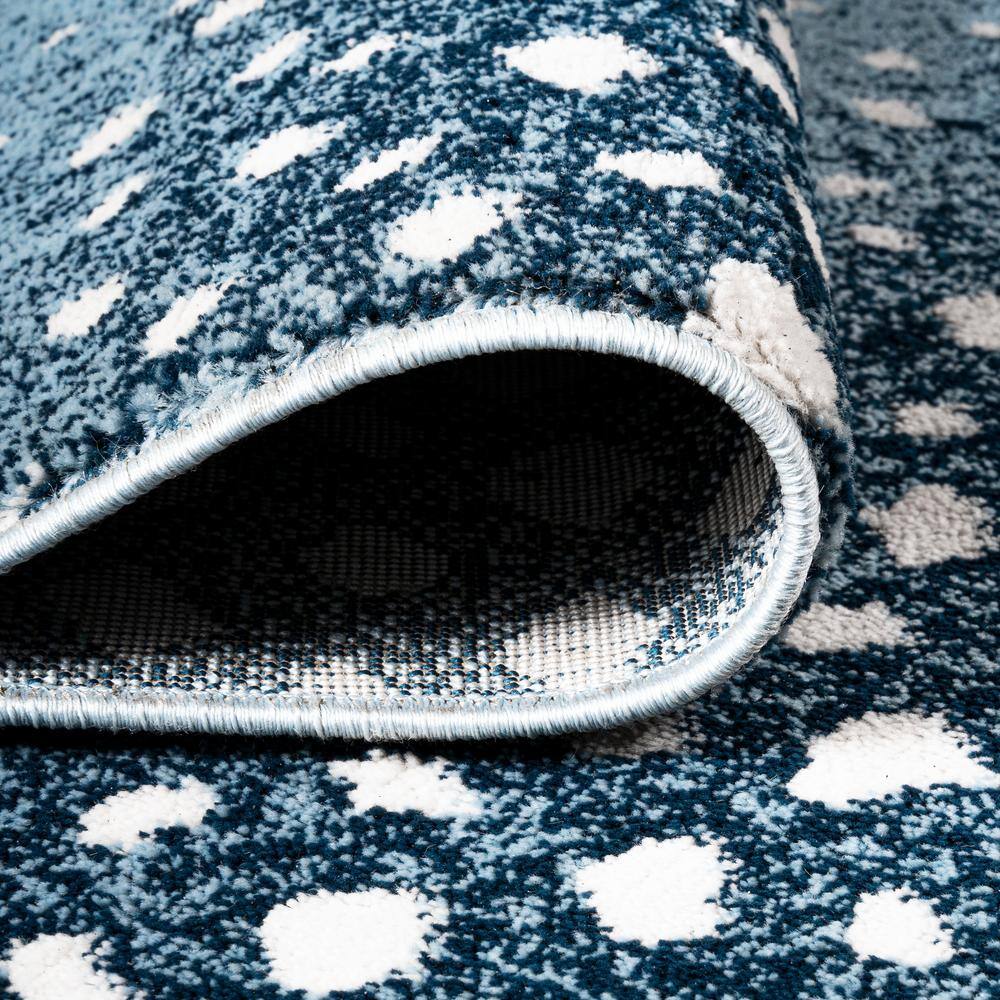 Ivory and Blue Abstract Antelope Washable Area Rug