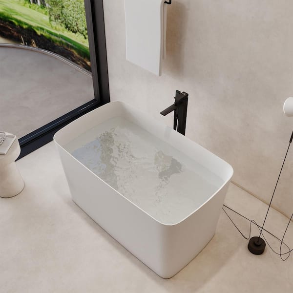 47 in. x 27.6 in. Freestanding Stone Resin Solid Surface Rectangular Soaking Bathtub in Matte White with Seat