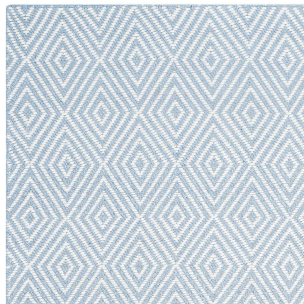Handmade Light Blue and Ivory Wool Area Rug 4' x 6'