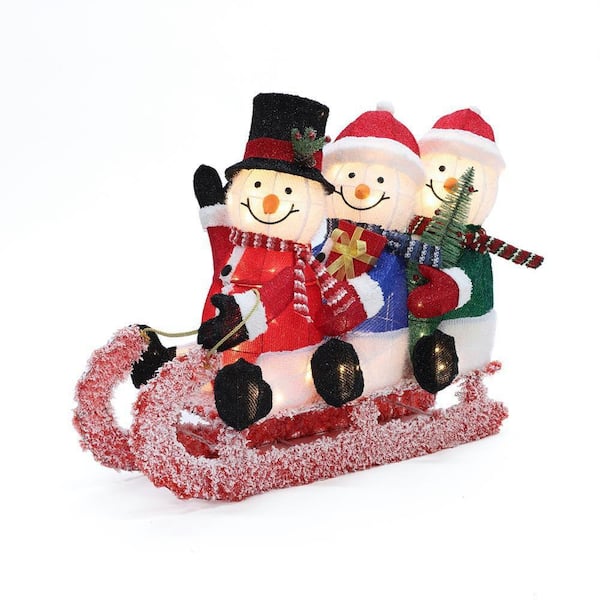 LuxenHome 29 in. Lighted Snowman Family on Sled in Winter Coats