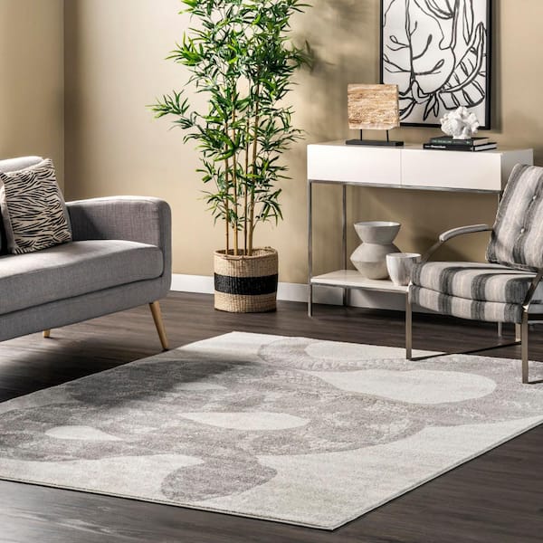 https://images.thdstatic.com/productImages/ad9cf7e5-342f-5374-9681-51bde0c9653b/svn/light-gray-nuloom-area-rugs-bdtp04b-508-e1_600.jpg