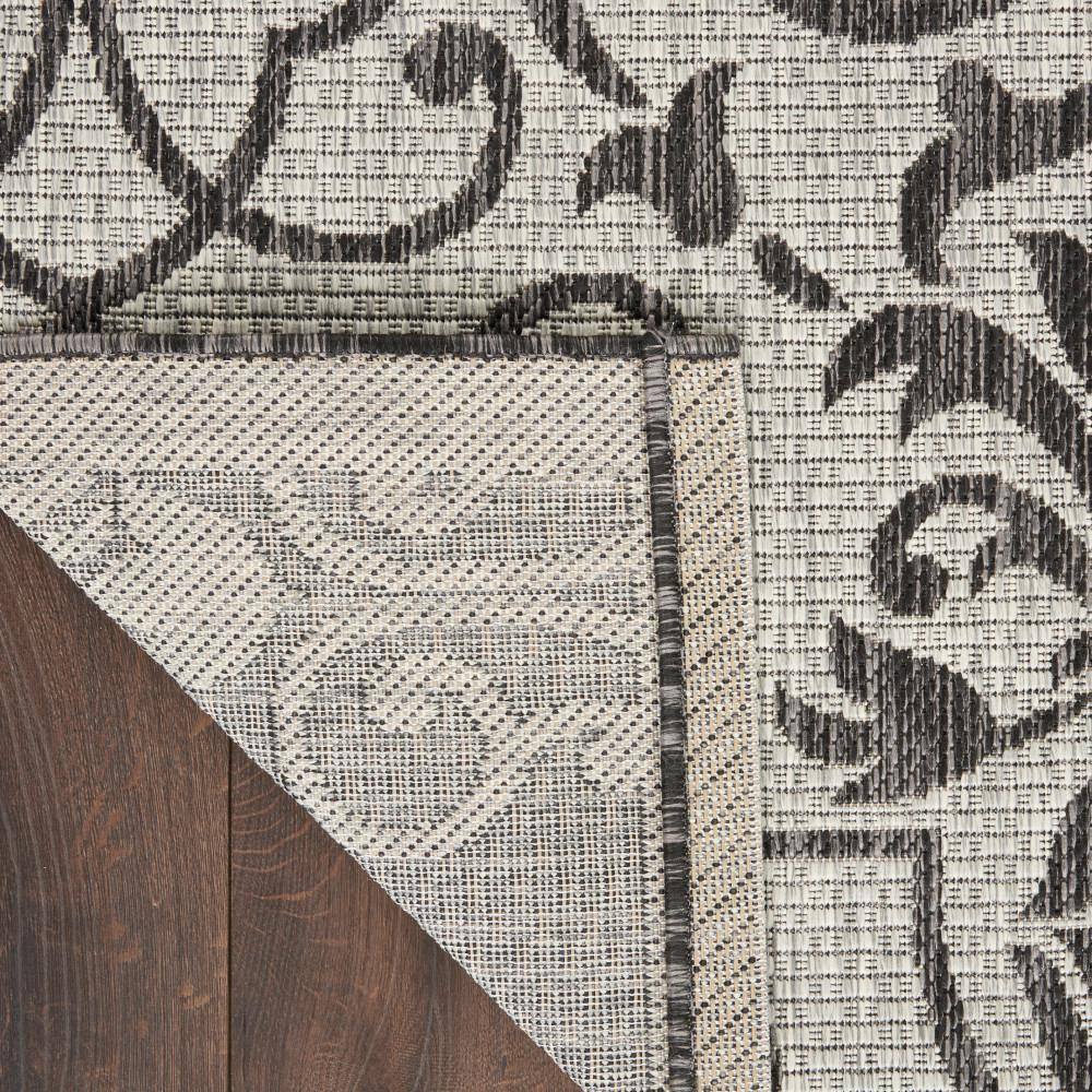 Ivory & Charcoal Round Synthetic Indoor/Outdoor Area Rug