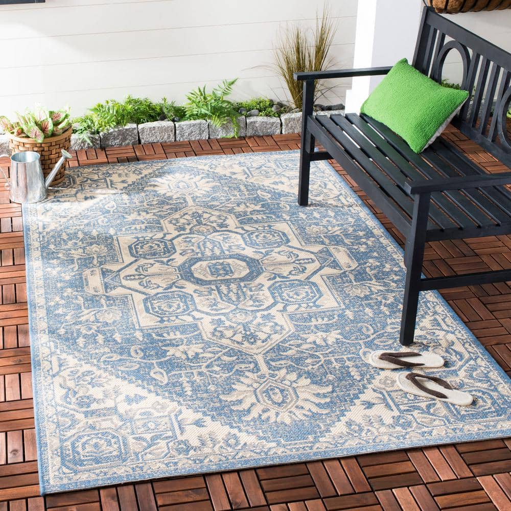 Cream and Blue Synthetic Medallion Indoor/Outdoor Area Rug