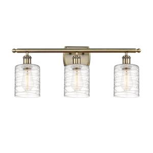 Cobbleskill 26 in. 3-Light Antique Brass Vanity Light with Deco Swirl Glass Shade