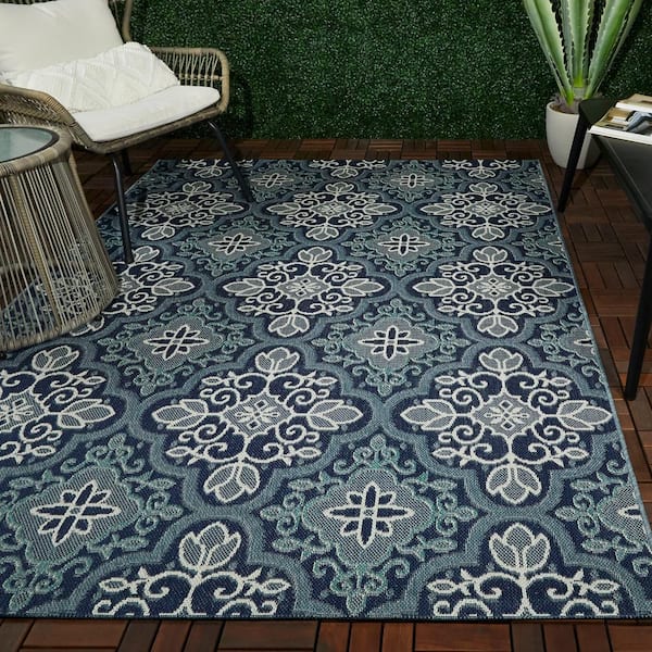 https://images.thdstatic.com/productImages/adcafb54-437e-45d8-8fbf-a34a34709a48/svn/blue-hampton-bay-outdoor-rugs-3091199-31_600.jpg