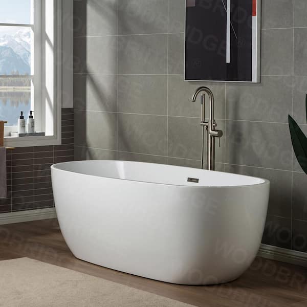 https://images.thdstatic.com/productImages/adcf4b5d-1c85-4a8f-a62a-51741201a07a/svn/brushed-nickel-woodbridge-claw-foot-tub-faucets-f1001-76_600.jpg