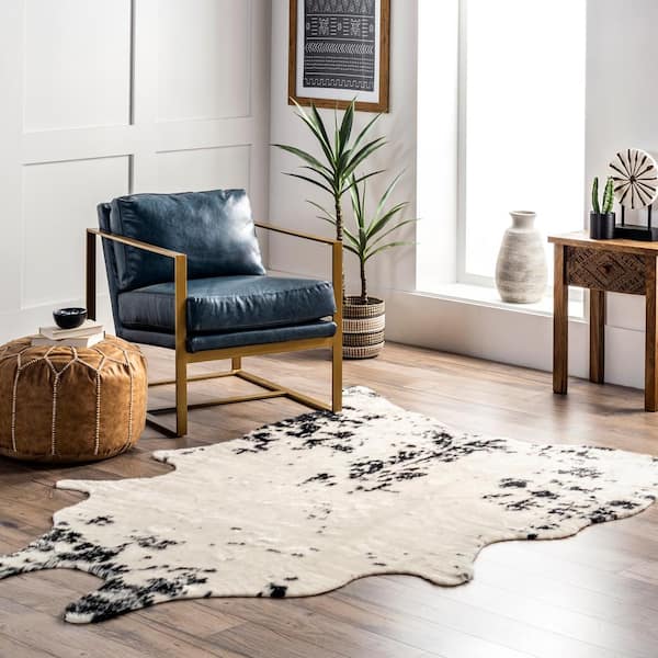 nuLOOM Marcia Machine Washable Faux Cowhide Black Doormat 4 ft. x 5 ft. Accent Rug