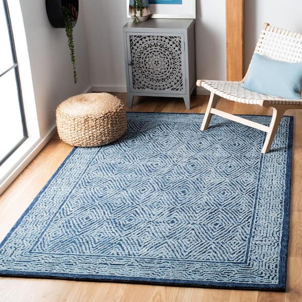 Capri Navy 6 ft. x 9 ft. Border Diamond Area Rug