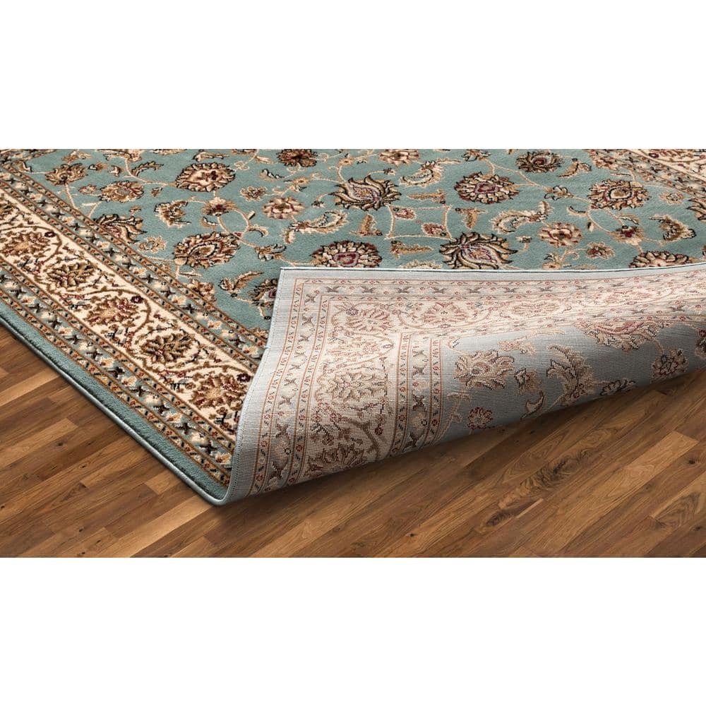 Light Blue and Ivory Synthetic Oriental Area Rug 5'3" x 7'3"