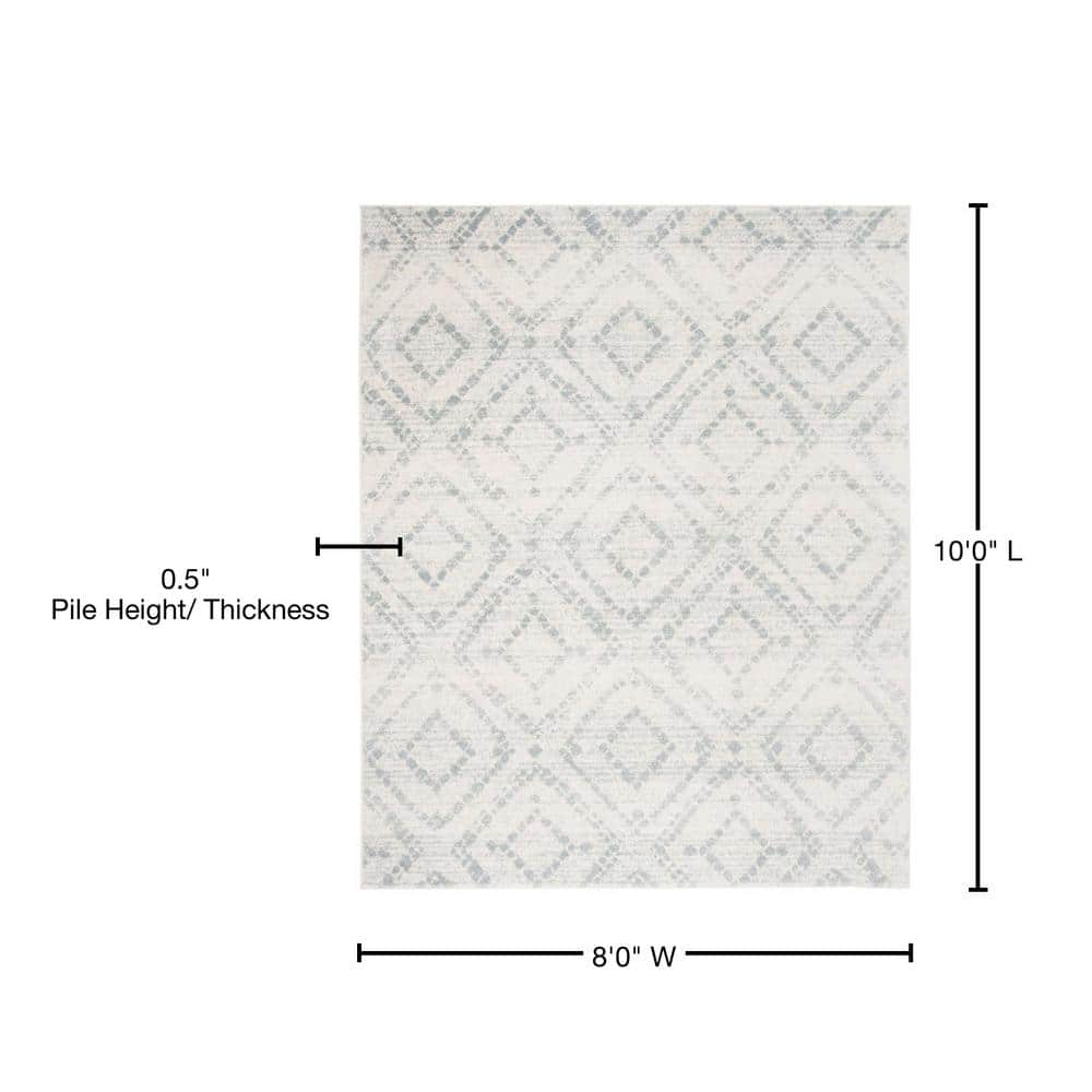 Ivory and Light Blue Geometric 8' x 10' Synthetic Area Rug