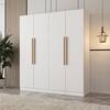 White wardrobe standing in a styled room.