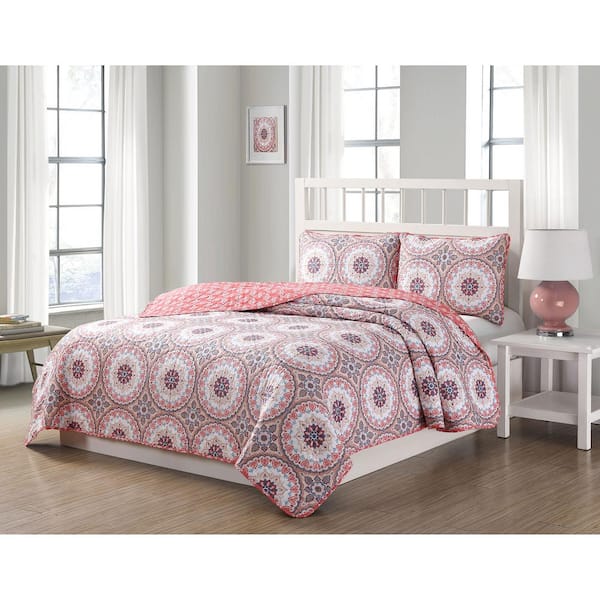 pink and blue quilt set