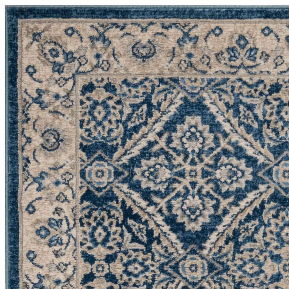 Navy and Cream Synthetic Bohemian Area Rug with Border Embellishment