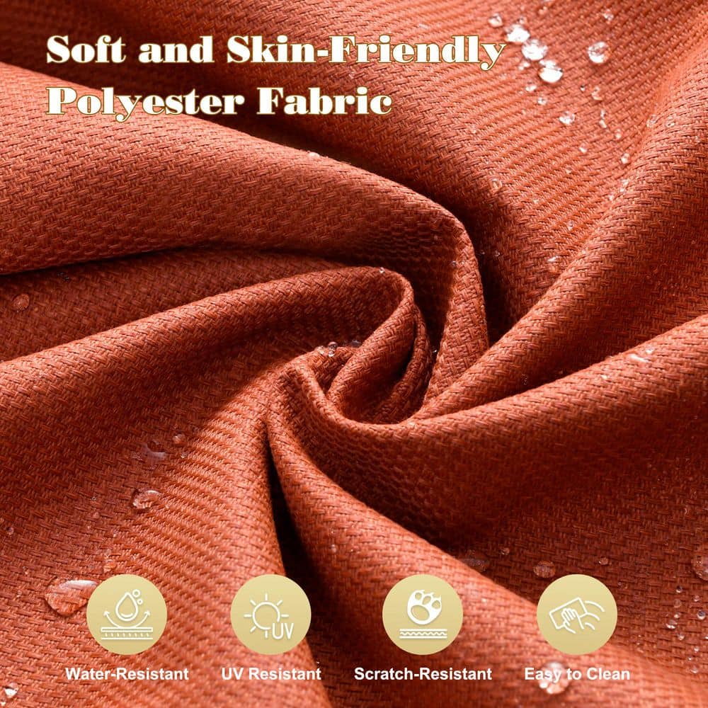 Close-up of the orange-red polyester fabric cushion material.