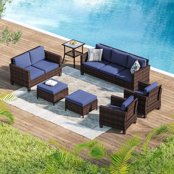 Sonkuki 7-Pieces Patio Conversation Set with Side Table, Outdoor Armchair and Ottomans Brown Wicker with Navy Blue Cushions