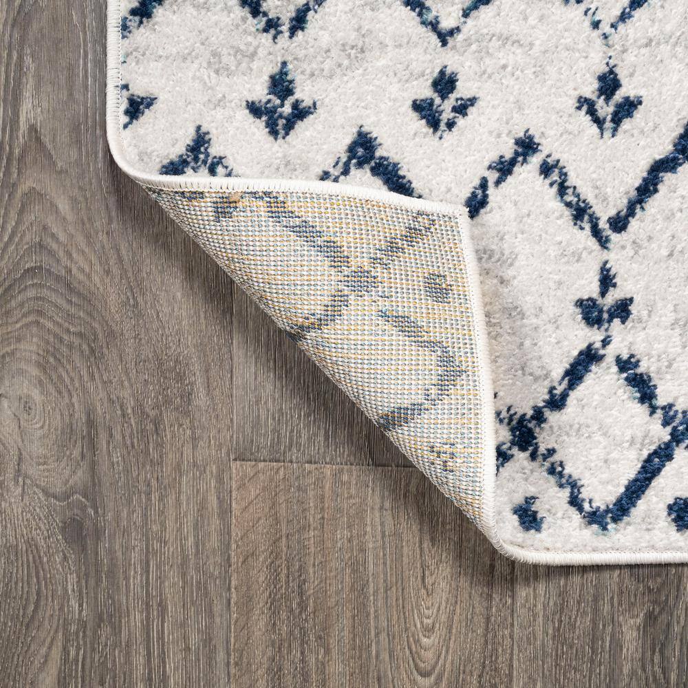 Ivory and Navy 4' x 6' Synthetic Trellis Area Rug