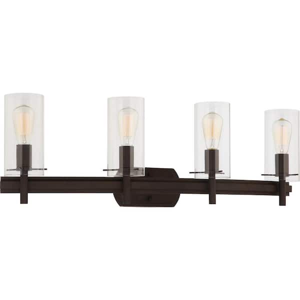 Volume Lighting Regina 4-Light 8 in. Antique Bronze Indoor Bathroom Vanity Wall Sconce or Wall Mount with Clear Glass Cylinder Shades