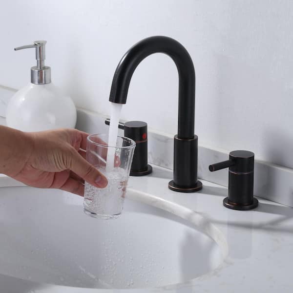 8 in. Widespread Double Handle Bathroom Faucet with Swivel Spout, Pop Up Drain and Supply Lines in Oil Rubbed Bronze