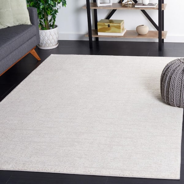 Continental 7 ft. x 7 ft. Ivory/Beige Parallel High-Low Square Area Rug