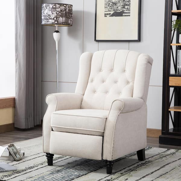 cream tufted recliner