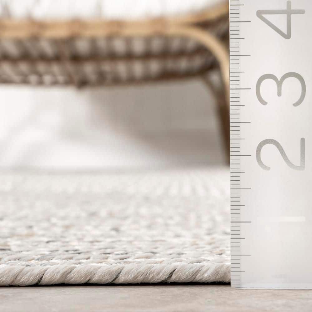 Handmade Ivory Braided 4' x 6' Oval Synthetic Area Rug