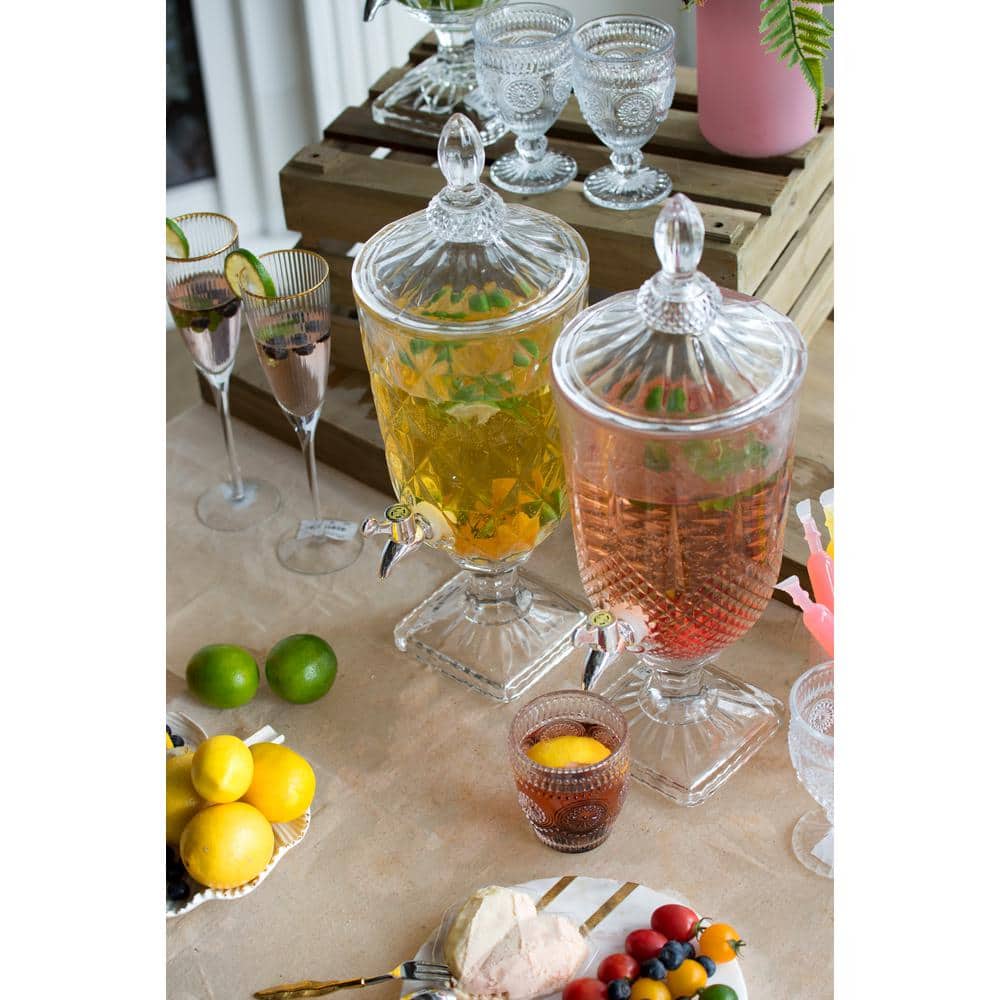 Elegant Clear Glass Beverage Dispenser with Polished Silver Lid