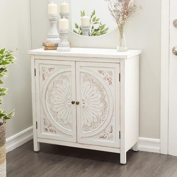 Litton Lane White Wood Intricately Carved 1 Shelf and 2 Doors Floral Cabinet