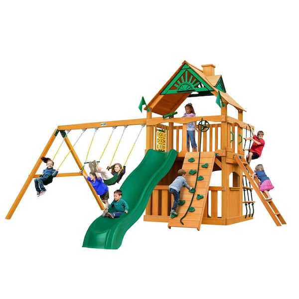Gorilla Playsets Chateau Clubhouse Wooden Outdoor Playset with Wave Slide, Rock Wall, Climbing Net, and Backyard Swing Set Accessories