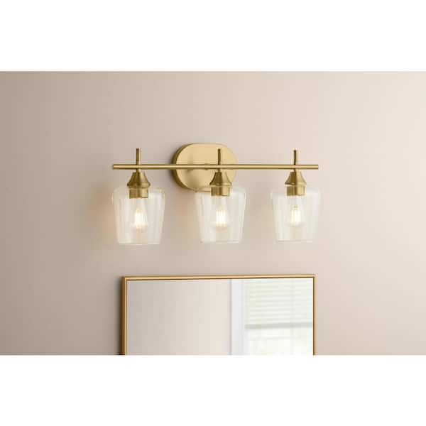 Hampton Bay Pavlen 24 in. 3-Lights Antique Brass Vanity Light with Clear Glass Shades