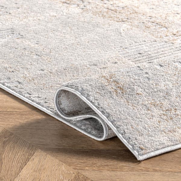 https://images.thdstatic.com/productImages/ae960b43-15ab-440f-b73c-99f58d69e510/svn/light-gray-nuloom-area-rugs-ercl01b-8010-1f_600.jpg