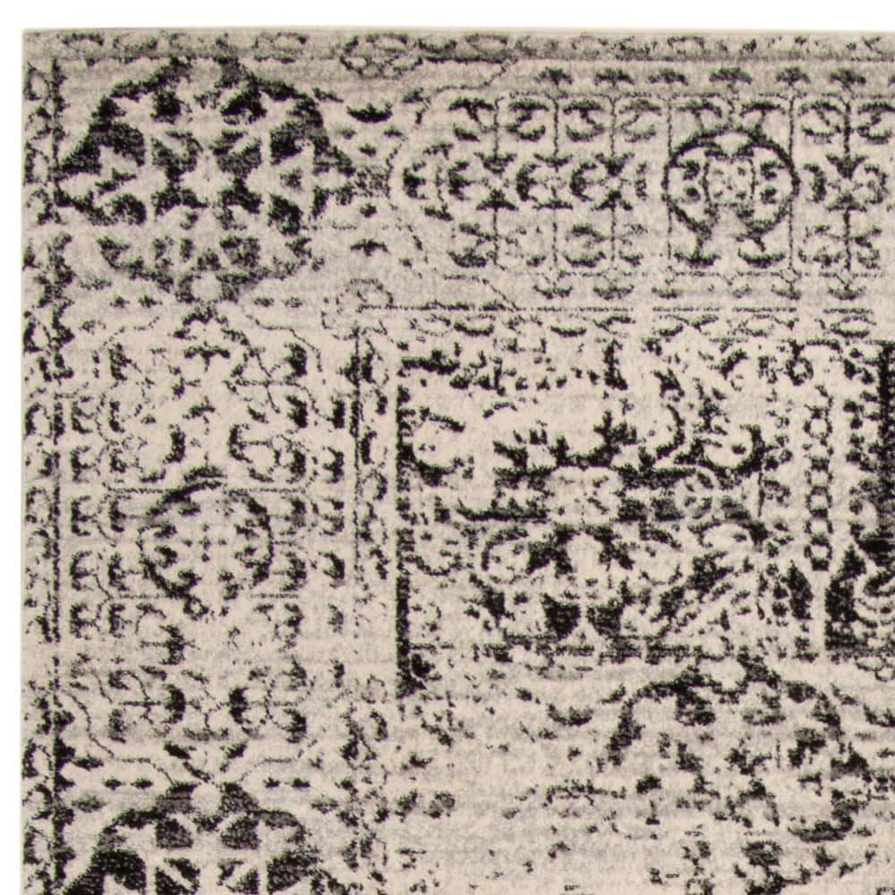 Chic Reversible Black/Ivory Synthetic 8' x 10' Area Rug
